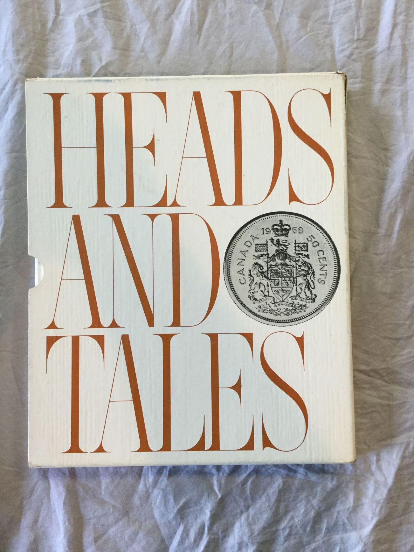 Book - Heads and Tales