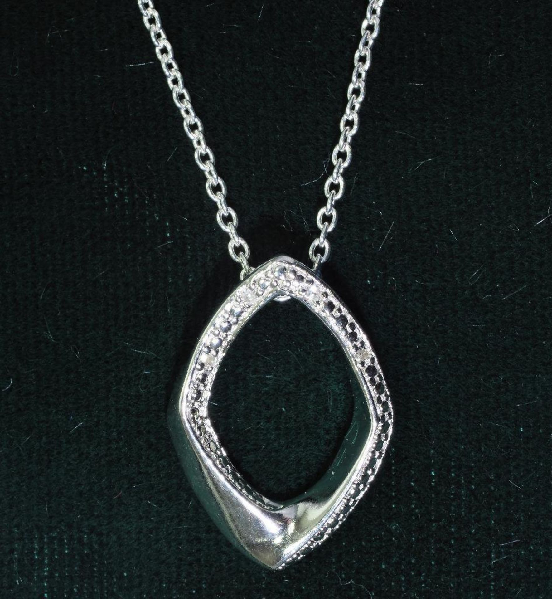 Sterling Silver Diamond Pendant, Retail $120 (MS05 - 16)