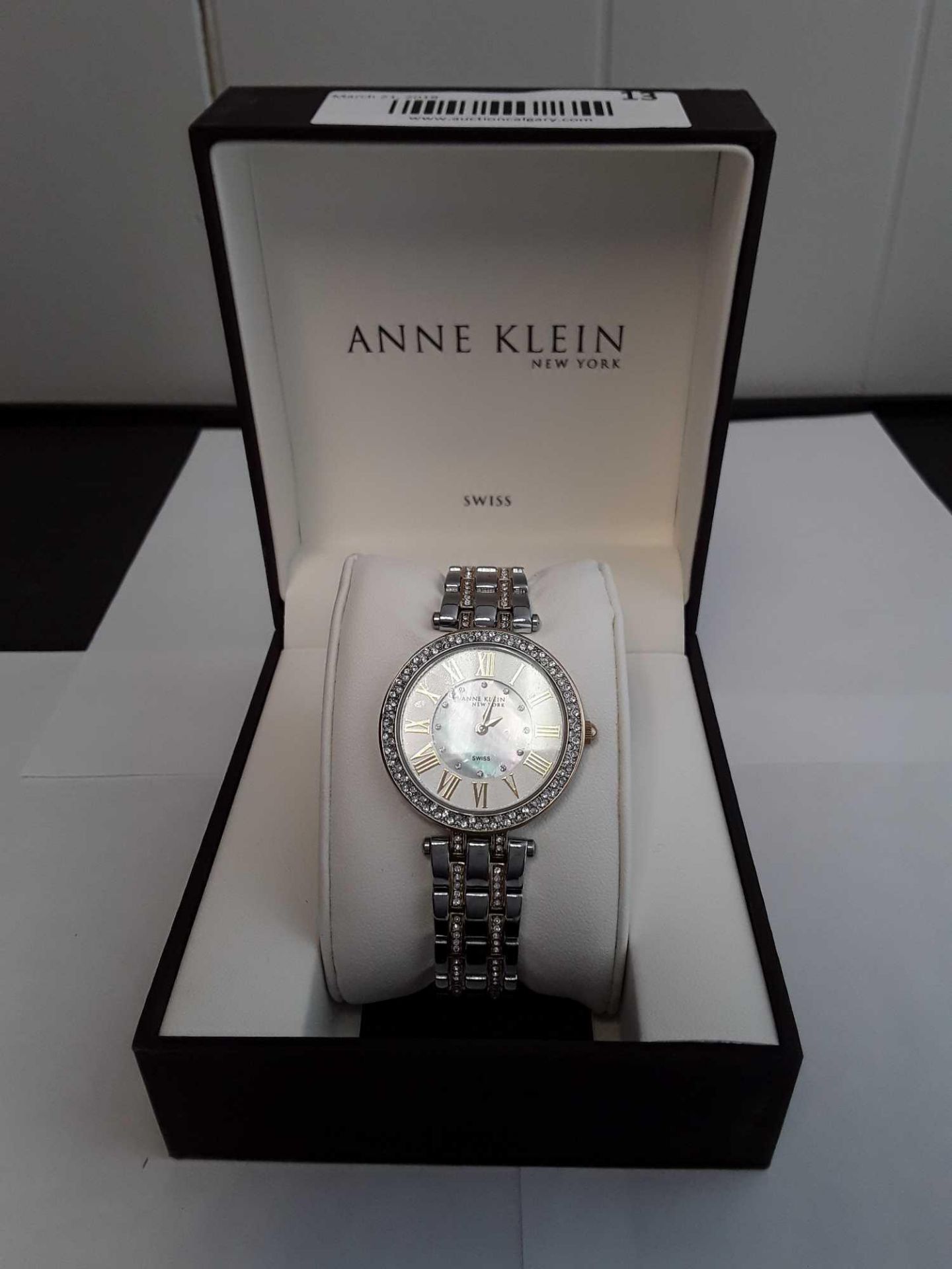 Anne Klein Women's Watch - Crystals around Face and On Silver Band includes Box