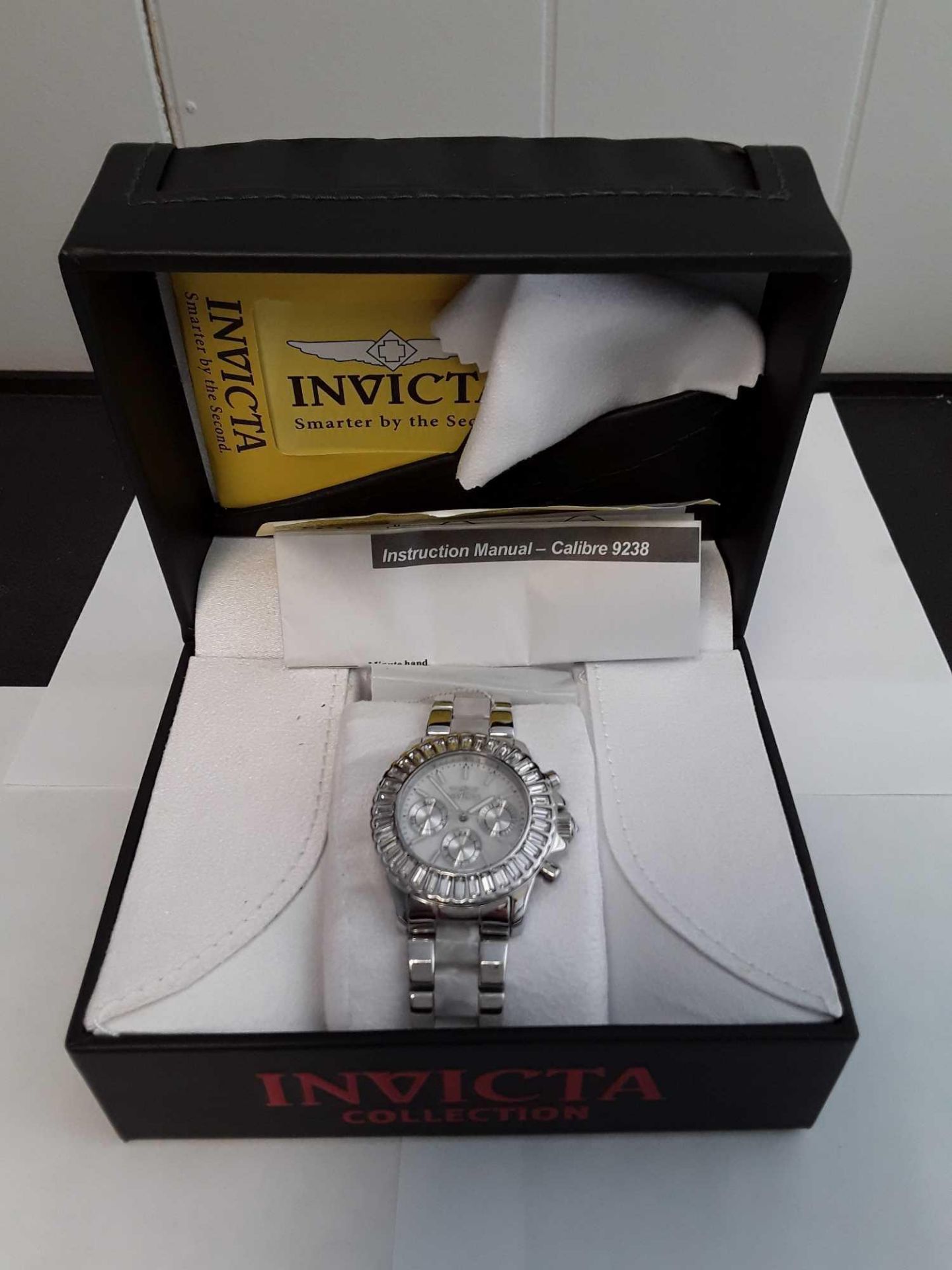 Invicta Divers Watch with Crystals around Face - Silver band and Includes box