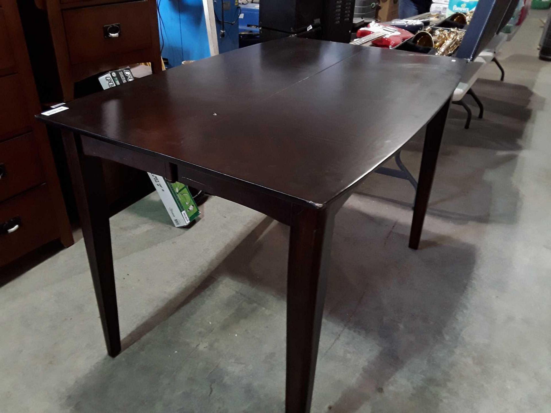 32" x 54" brown dining room table