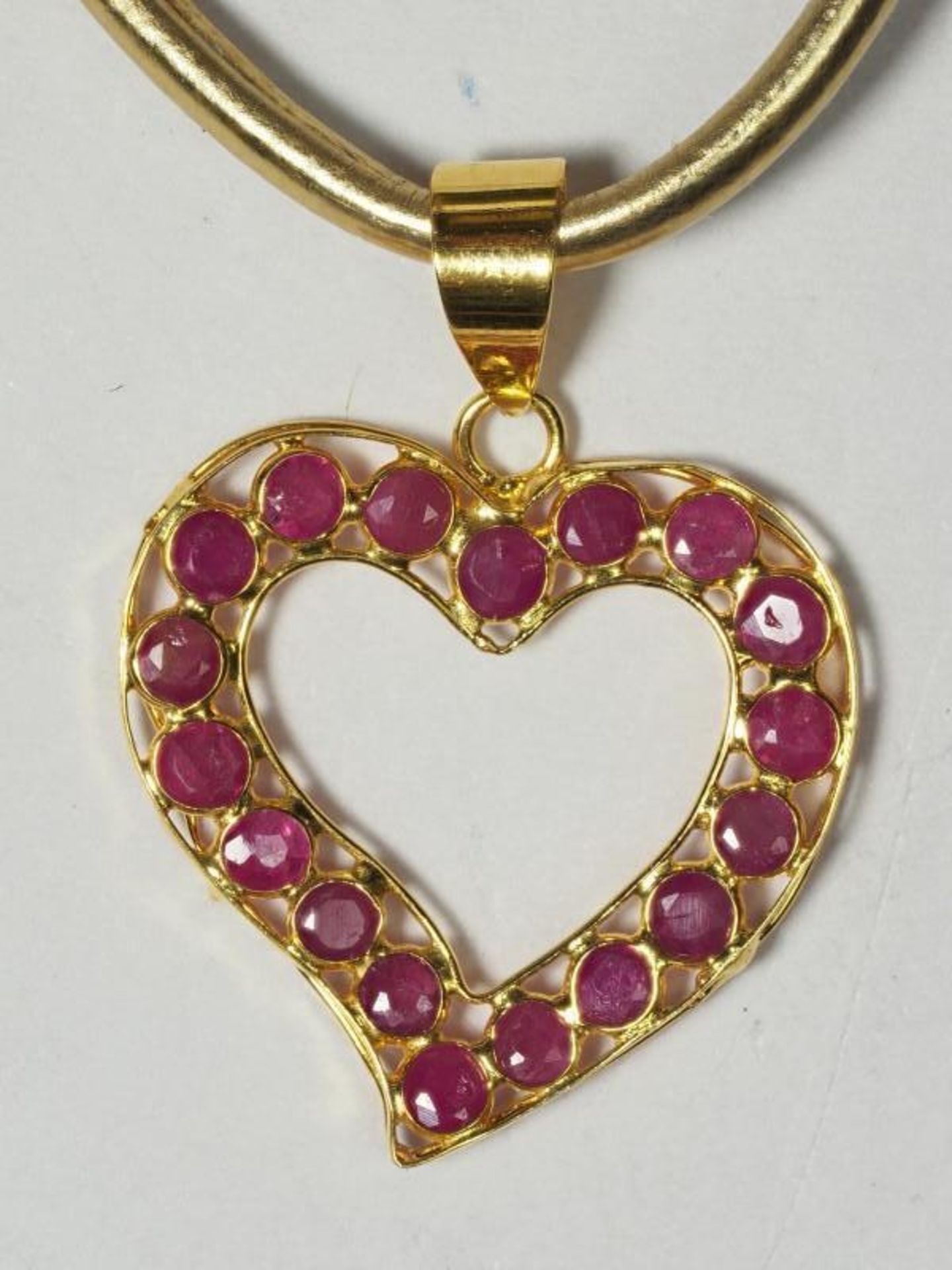 18K Yellow Gold 18 Ruby (0.70ct, July Birthstone) Heart Pendant with High Fashion Cord. Retail Appra