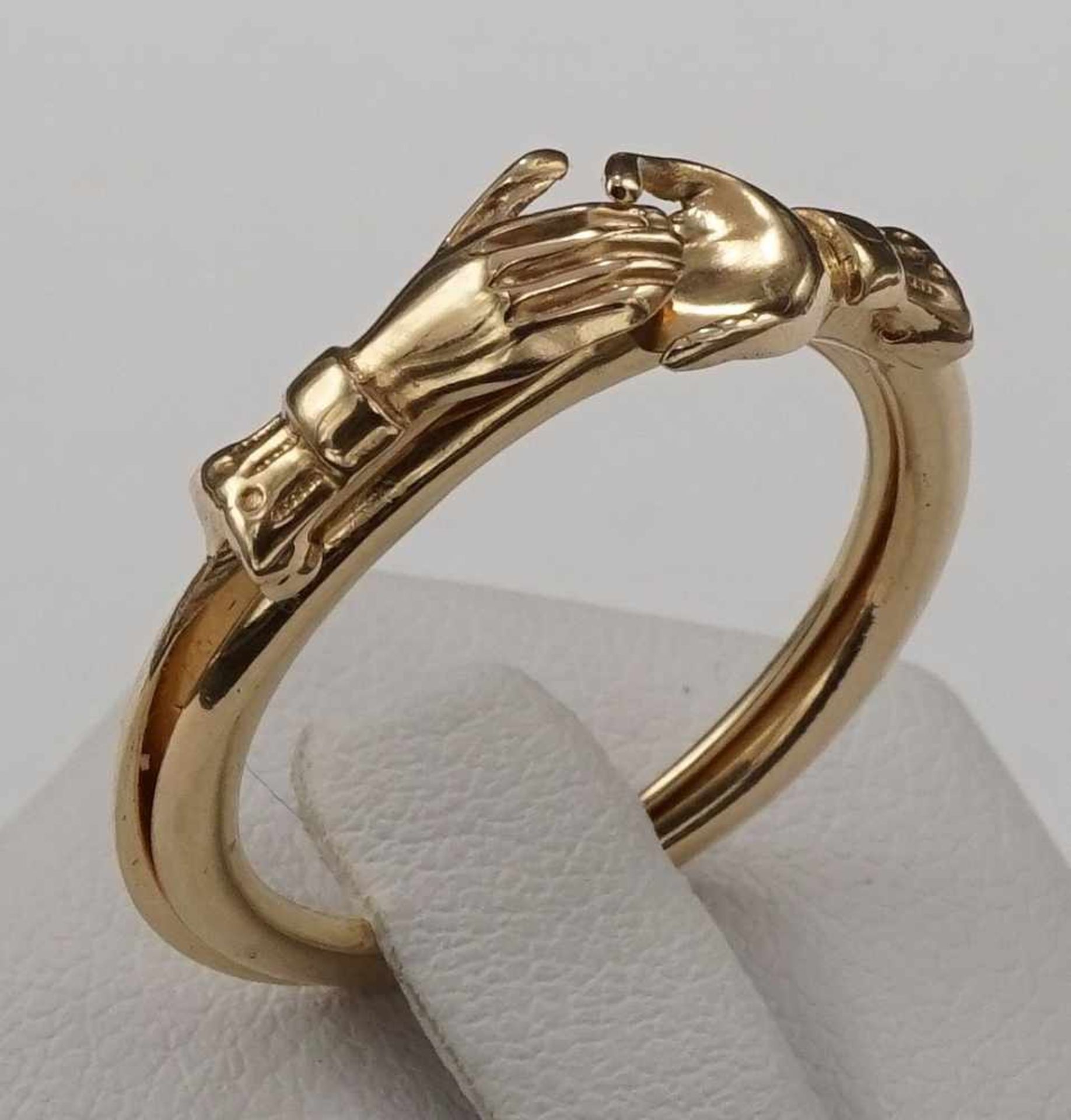 Zweiteiliger Goldring "Hand in Hand"2. Hälfte 20. Jh., 585/- Gelbgold, zweiteiliger Ring