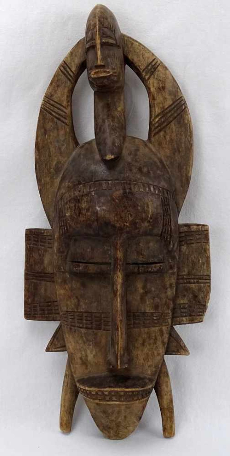 Sinufumaske, Elfenbeinküstealt patiniertes Holz, guter Zustand, L. 47 cm