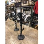 Pair of wrought iron double lamp stands