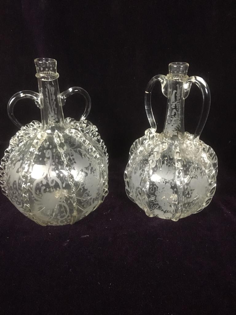 Pair of acid etched and pinch decorated glass wine ewers