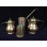 Selection of copper and brass measures and covered jugs