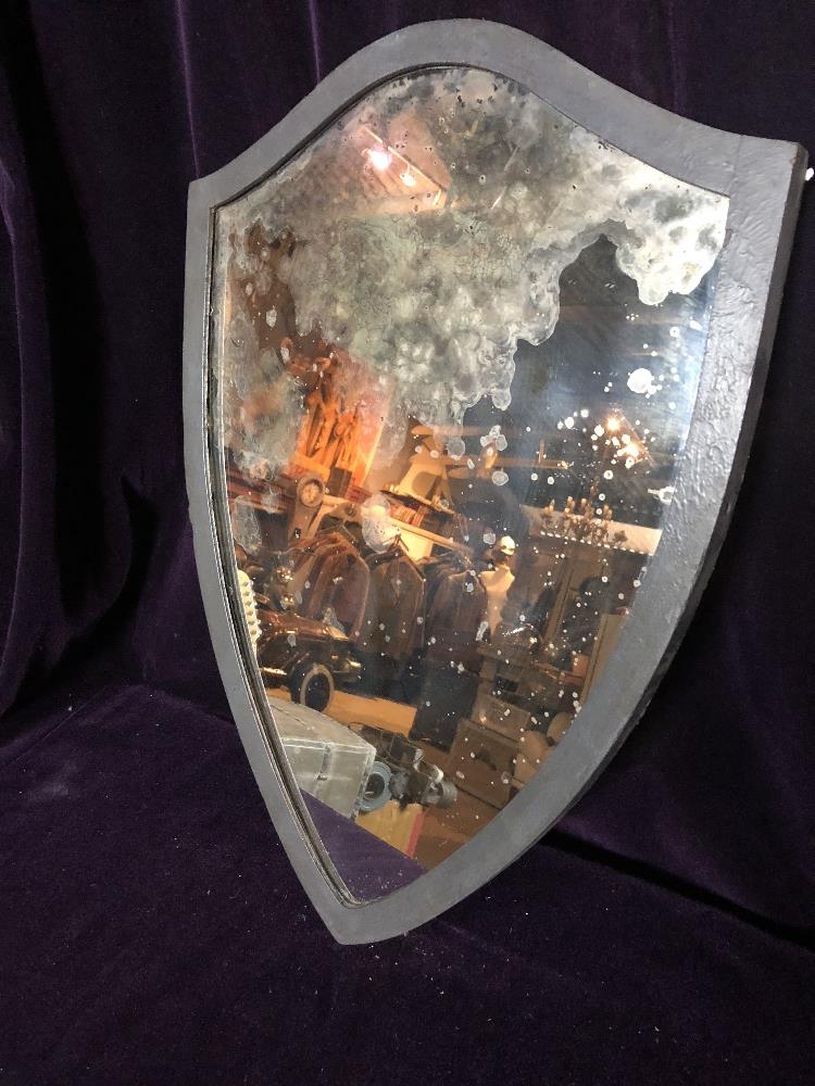 Shield shaped mirror