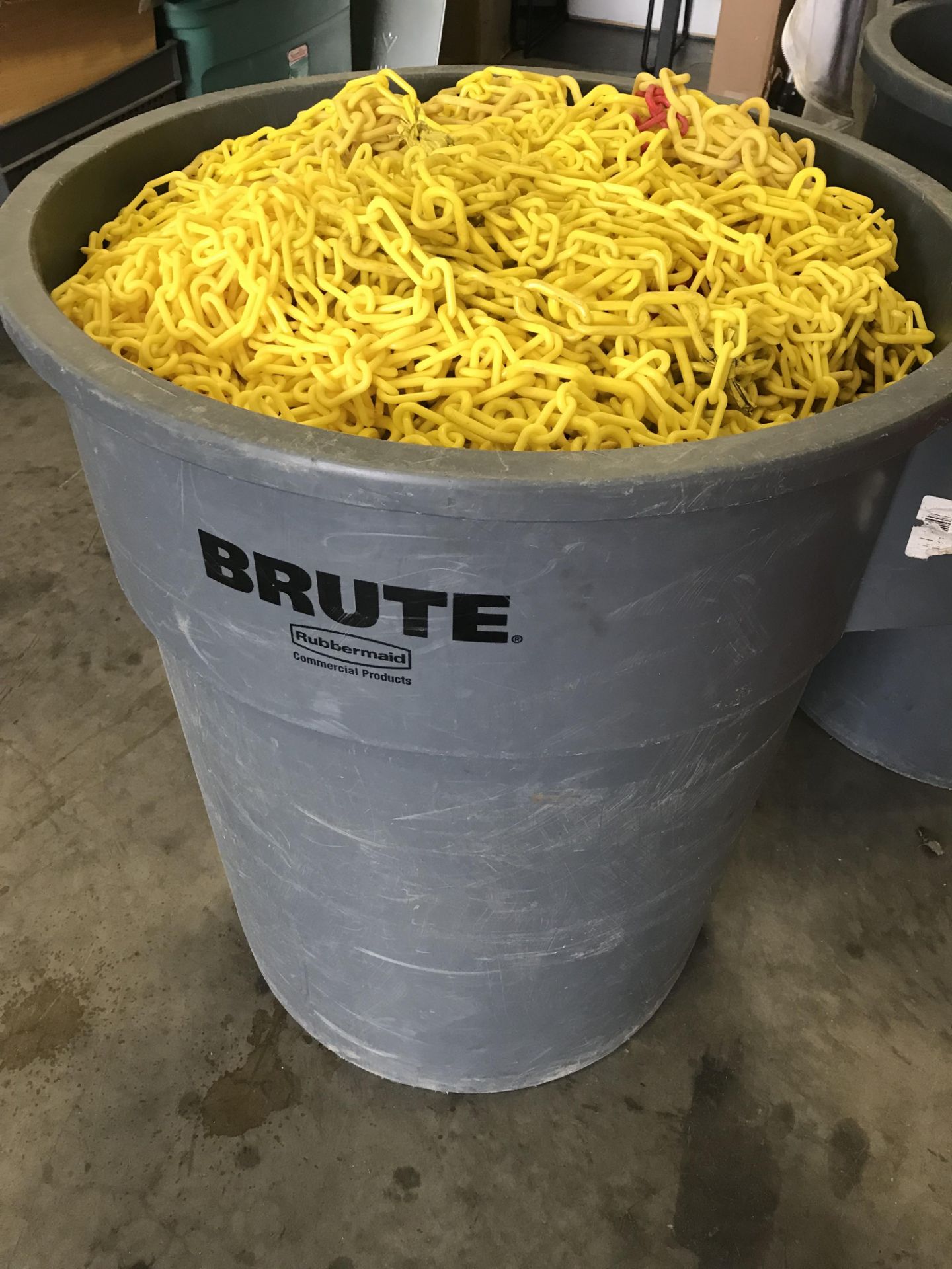 55 GALLON INDUSTRIAL TRASH CAN FILLED WITH PLASTIC SAFETY CHAIN