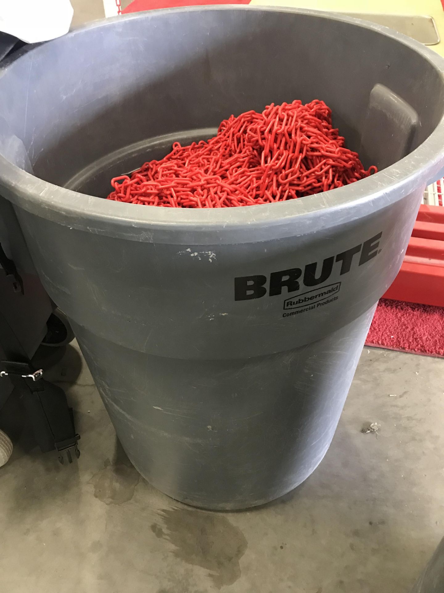 55 GALLON INDUSTRIAL TRASH CAN FILLED WITH PLASTIC SAFETY CHAIN