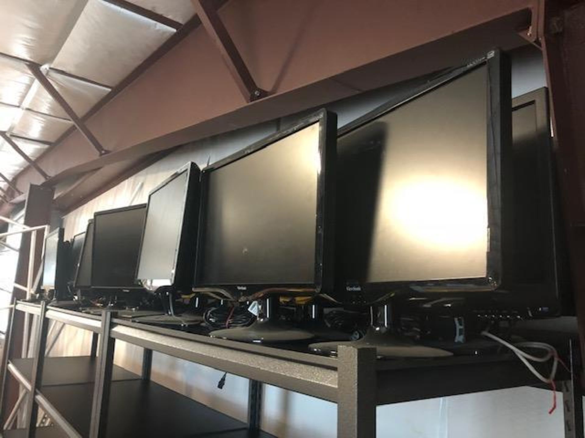 APPROXIMATELY 25 ASSORTED MONITORS