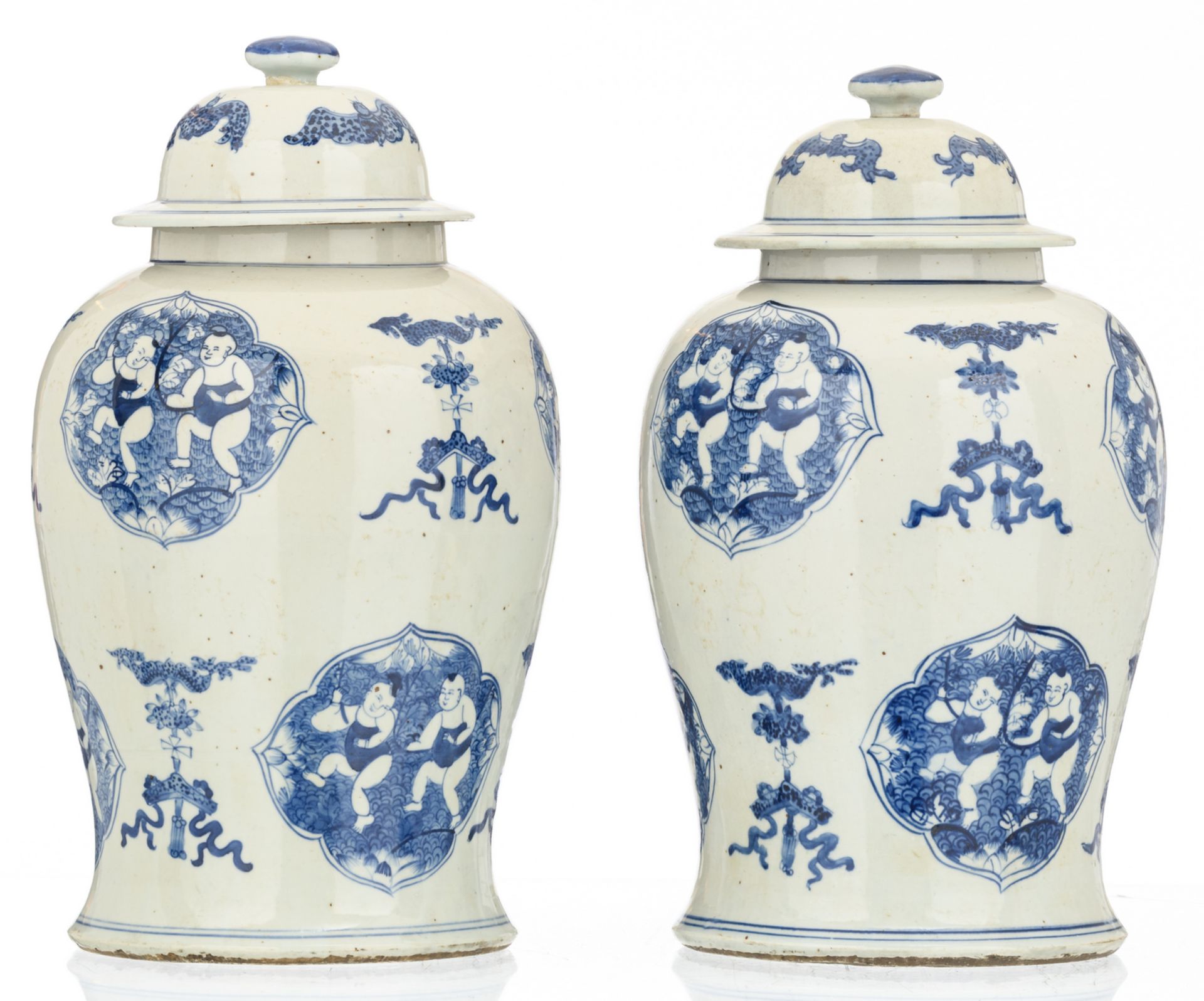 A pair of Chinese blue and white decorated vases and covers with auspicious symbols, the roundels - Image 2 of 6