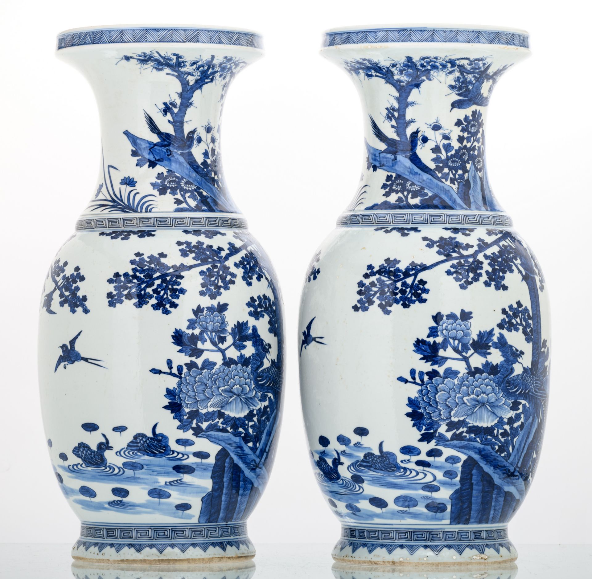 Two Chinese blue and white decorated vases with rocks, phoenix, birds and flower branches, H 65,5 - Image 4 of 6