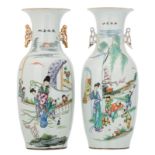 Two Chinese polychrome decorated vases with ladies, playing children in a garden and calligraphic