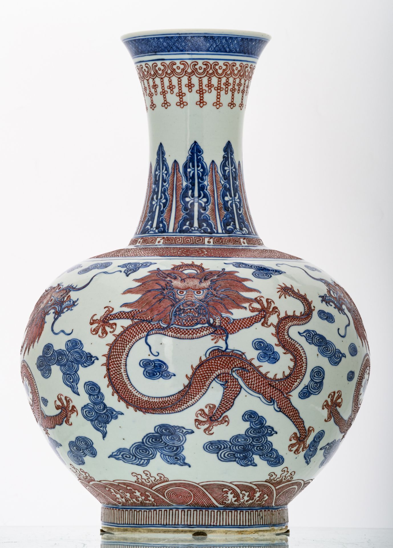 A Chinese cobalt blue underglazed and copperred glazed dragons amongst clouds decorated vase with - Image 2 of 6