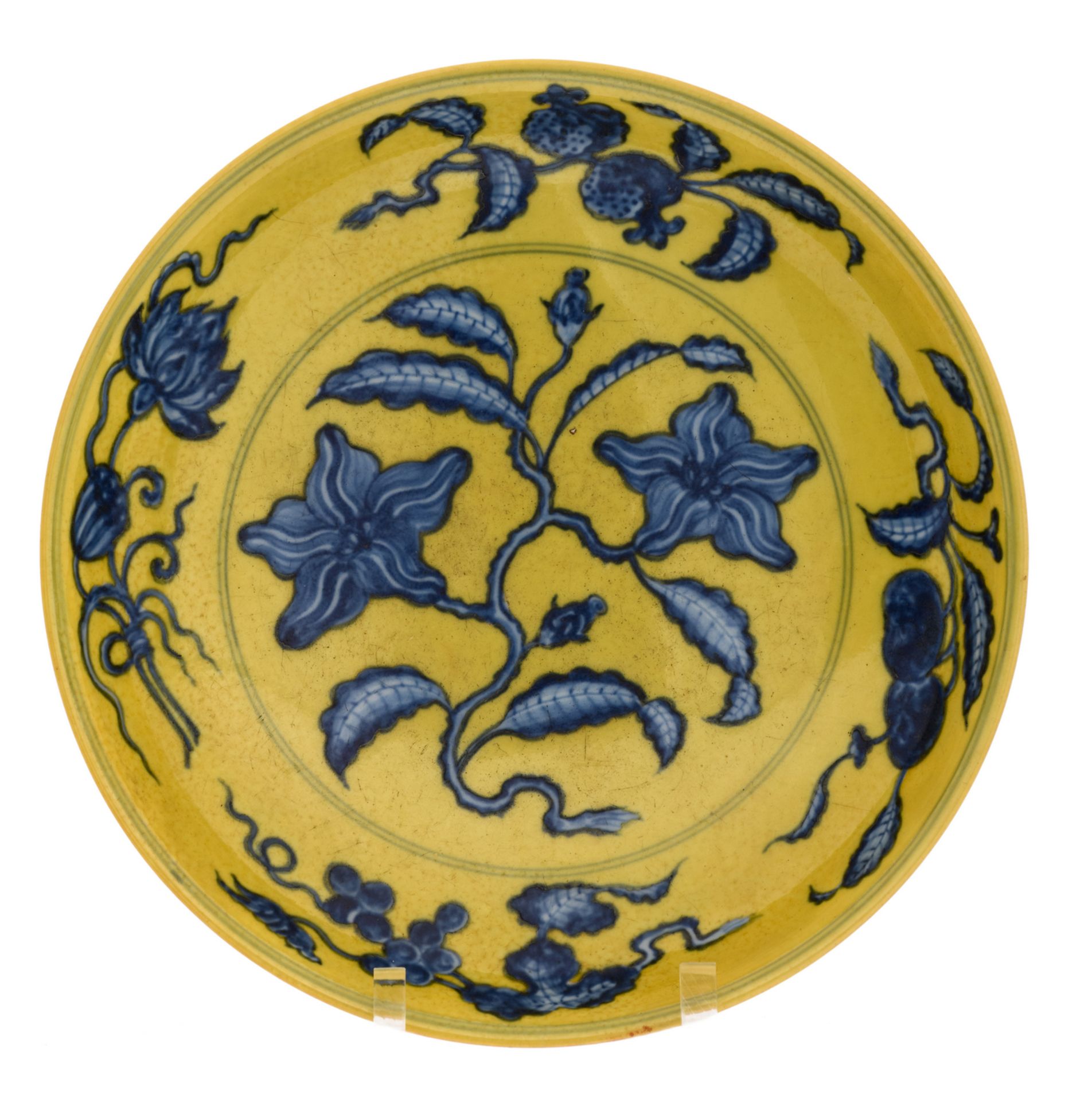 A Chinese yellow ground dish with cobalt blue floral underglaze decoration, with a Hongzhi mark, H