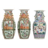 A Chinese famille rose floral decorated vase, the roundels with warriors and court scenes, 19thC;