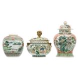 A Chinese famille verte floral decorated vase and cover and ginger jar, the roundels with landscapes