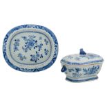 A Chinese blue and white floral decorated export porcelain octagonal tureen on a matching oval