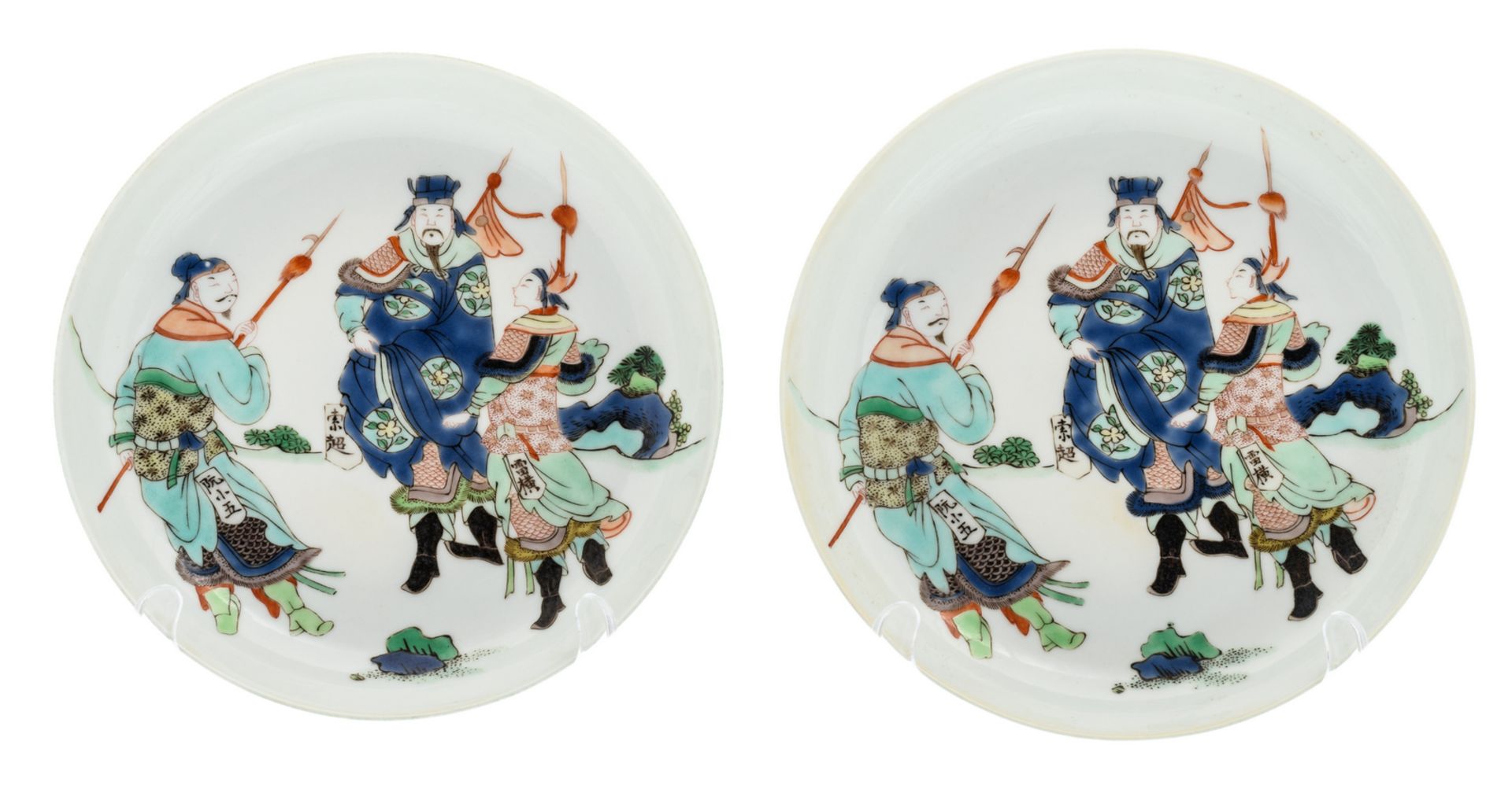 Two Chinese famille verte and green glazed dishes with warriors in a landscape, ø 22 cm