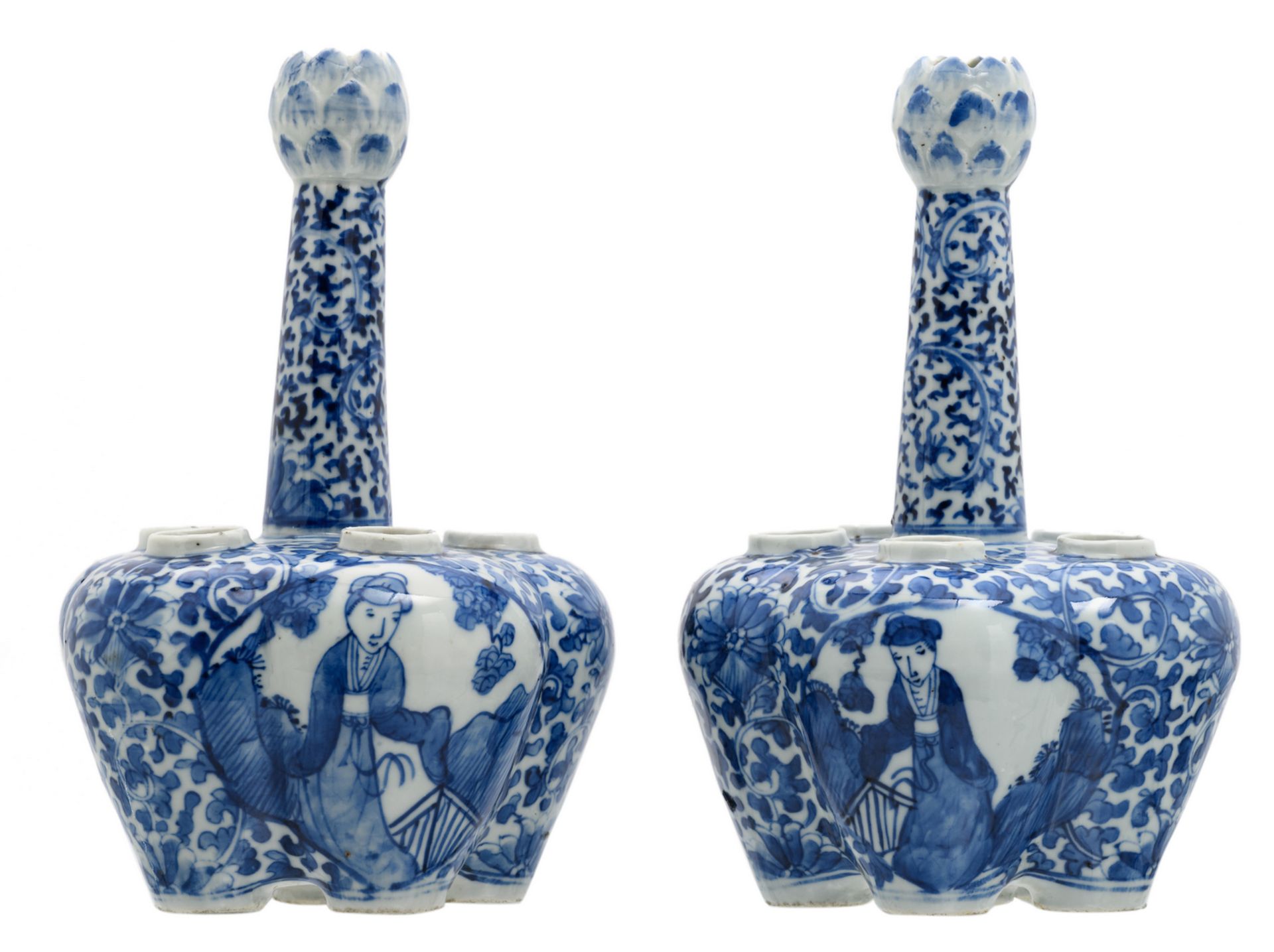 A pair of Chinese blue and white floral and relief decorated tulip vases, the roundels with