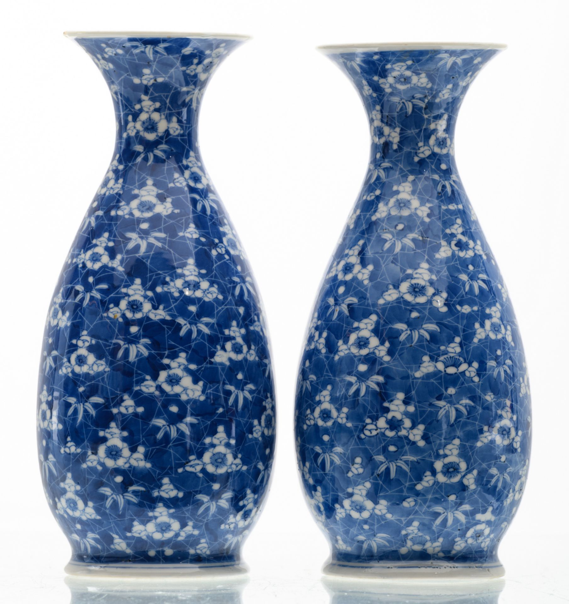 Two Japanese blue and white floral decorated vases, marked, Meiji and period, H 26 cm - Image 2 of 6