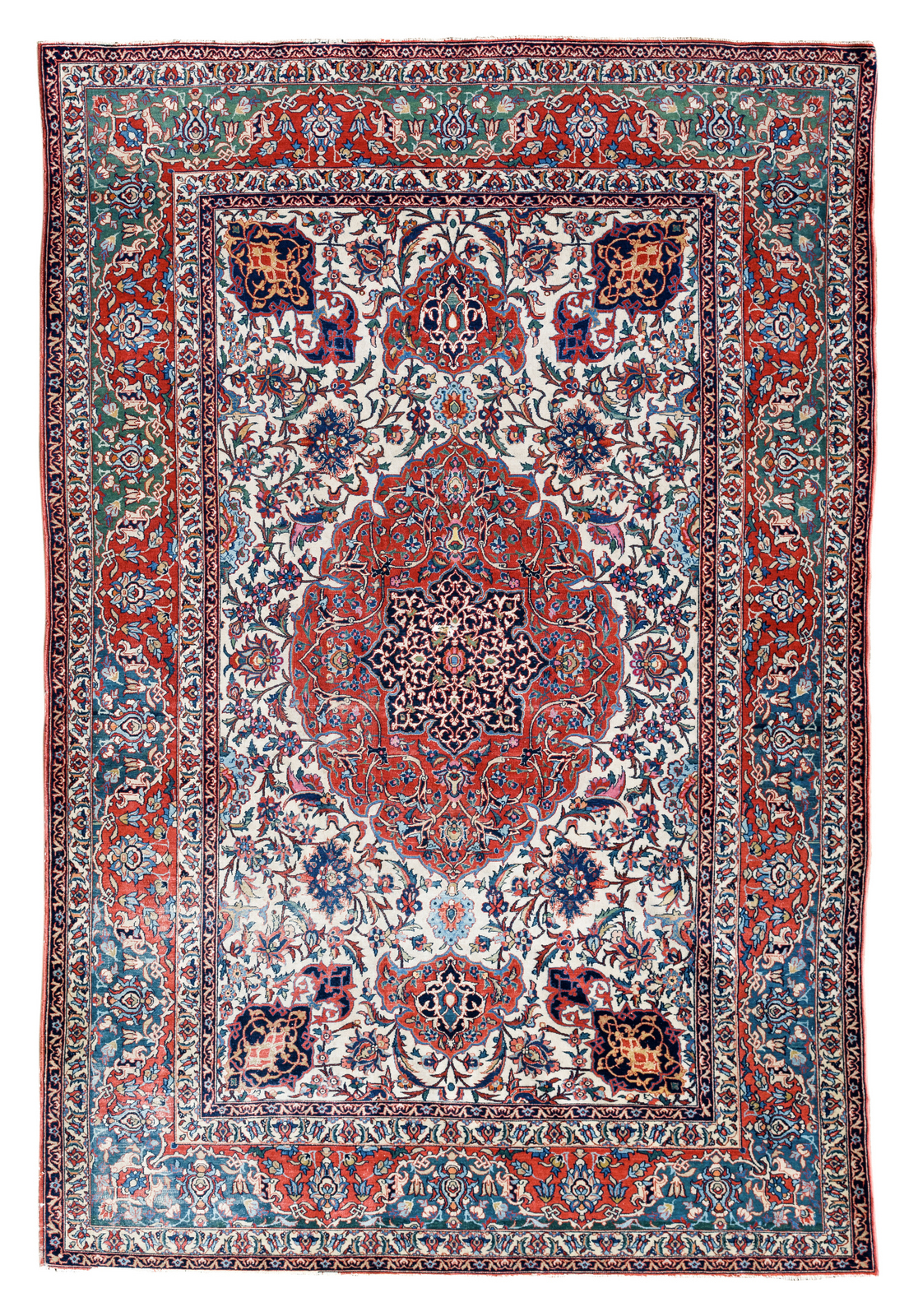 A fine Persian rug, wool and silk on cotton, decorated with floral motifs and a central medallion,