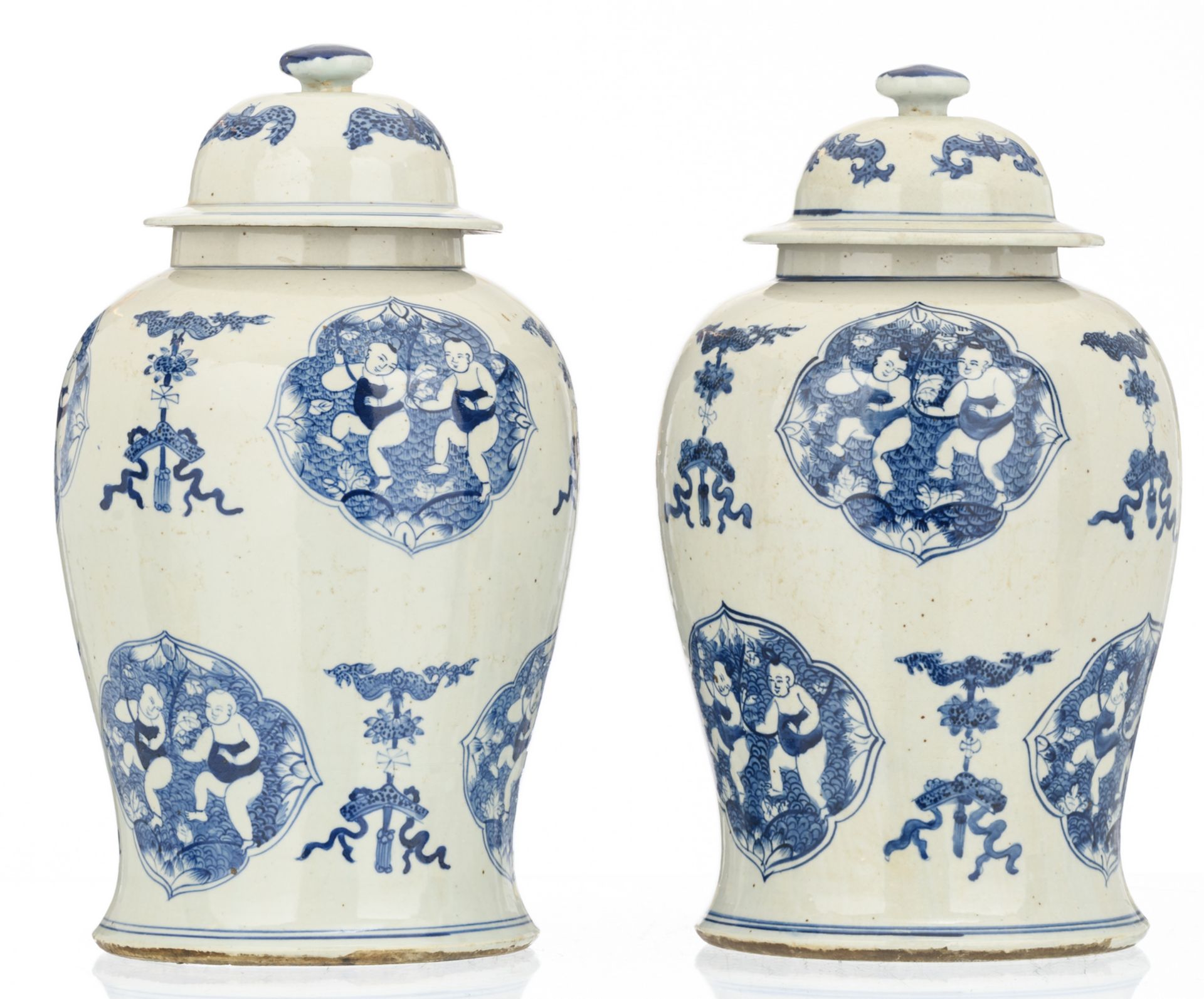 A pair of Chinese blue and white decorated vases and covers with auspicious symbols, the roundels - Image 4 of 6
