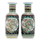 Two Chinese polychrome decorated rouleau shaped vases, the roundels famille verte with a court and a