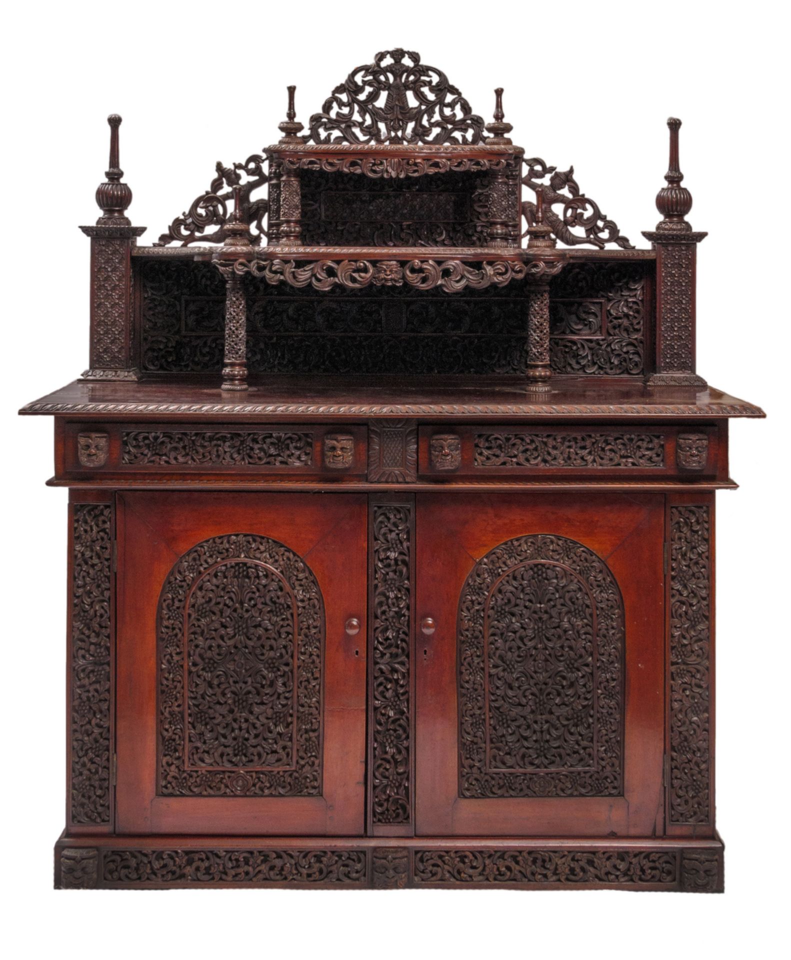 A richly carved exotic hardwood colonial sideboard, H 179 - W 154 - D 71 cm