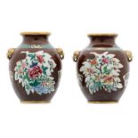 Two Chinese café au lait ground vases, the roundels famille rose, decorated with rocks, flower