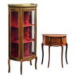 A small mahogany veneered French early Neoclassical display cabinet; added a French demi-lune