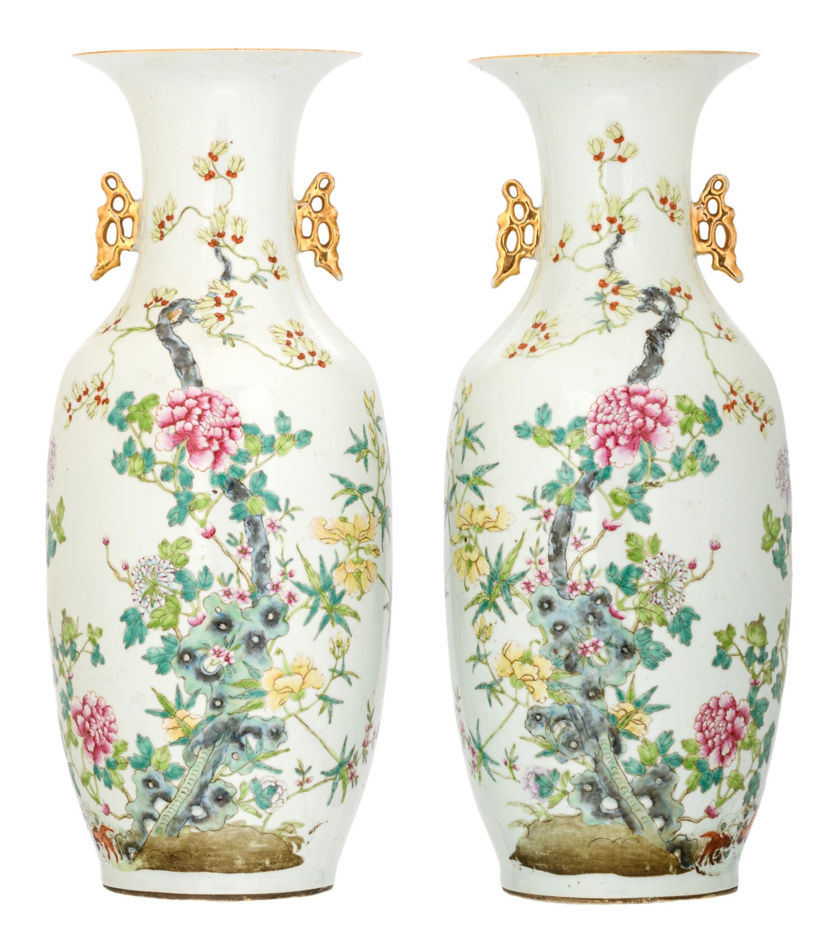A pair of Chinese famille rose decorated vases with flower branches on a rock and bats, marked, H 58