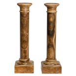 Two brown onyx marble stands, H 105,5 cm