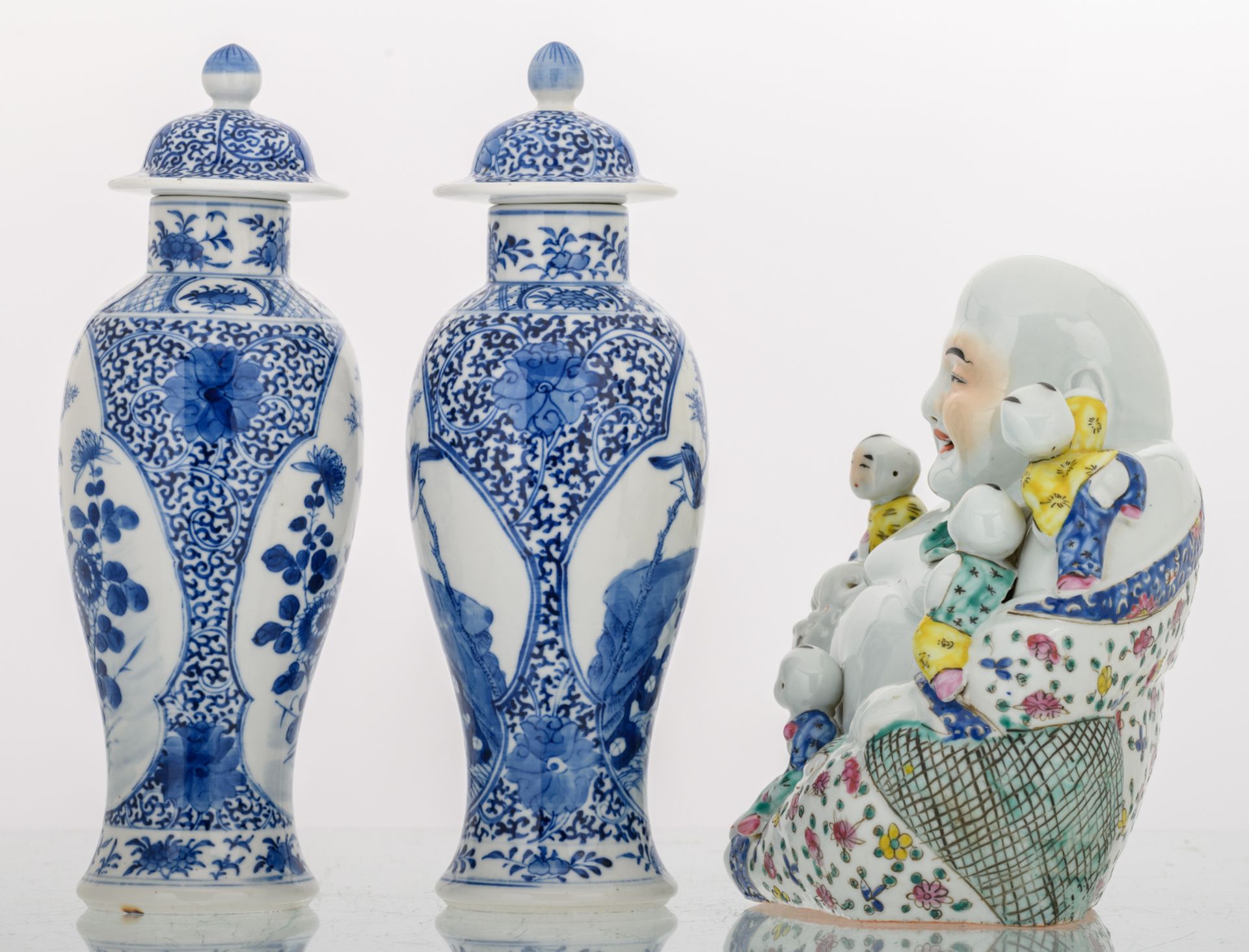 Two Chinese blue and white floral decorated baluster shaped vases and covers, the roundels with a - Image 2 of 7