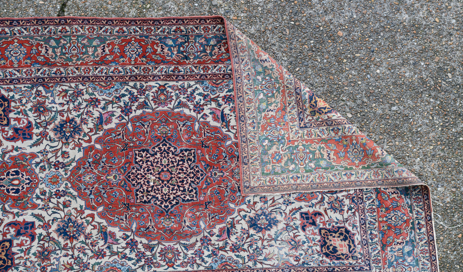 A fine Persian rug, wool and silk on cotton, decorated with floral motifs and a central medallion, - Image 4 of 4