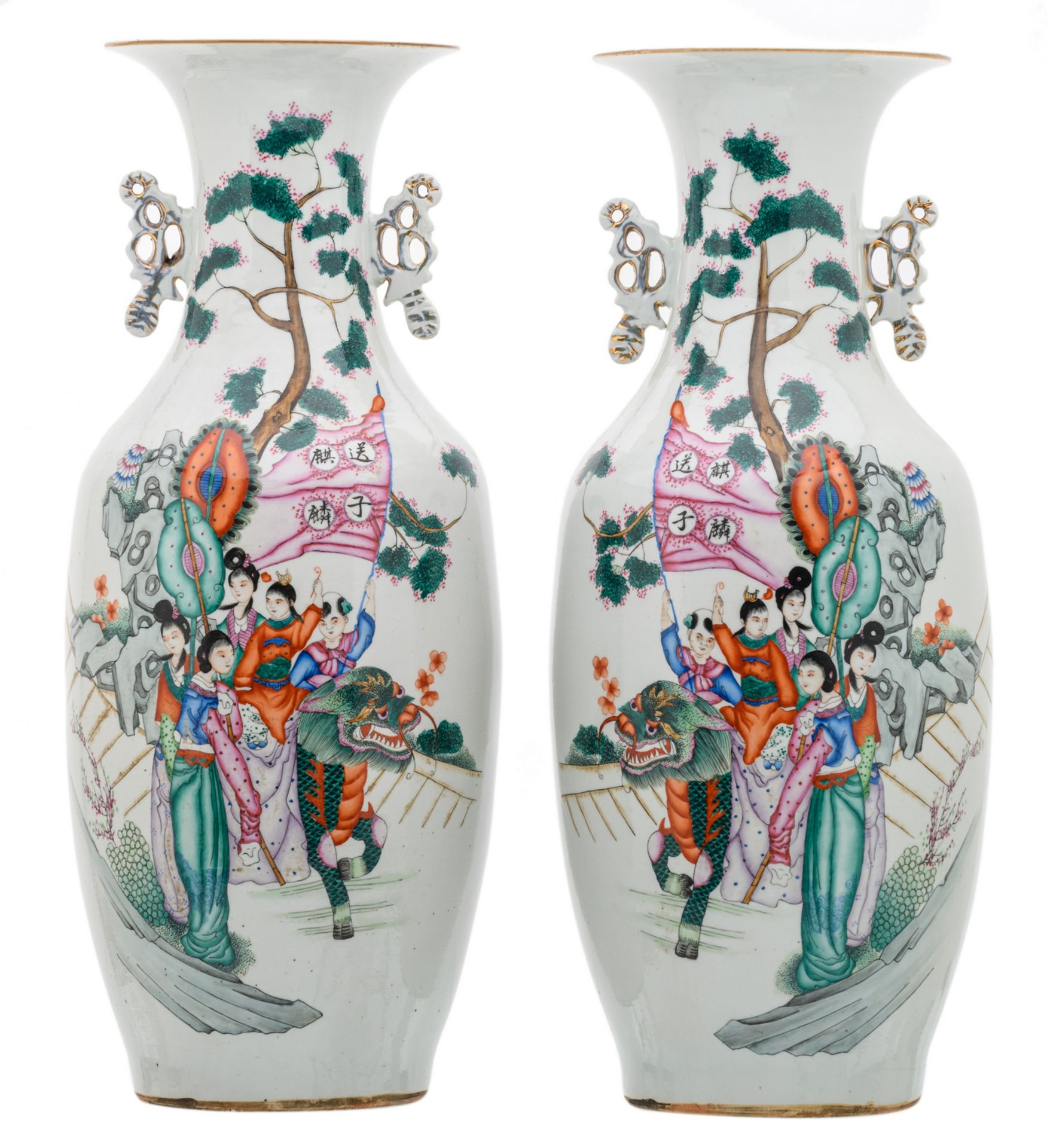 A pair of Chinese famille rose decorated vases with figures in a cortege and calligraphic texts, H
