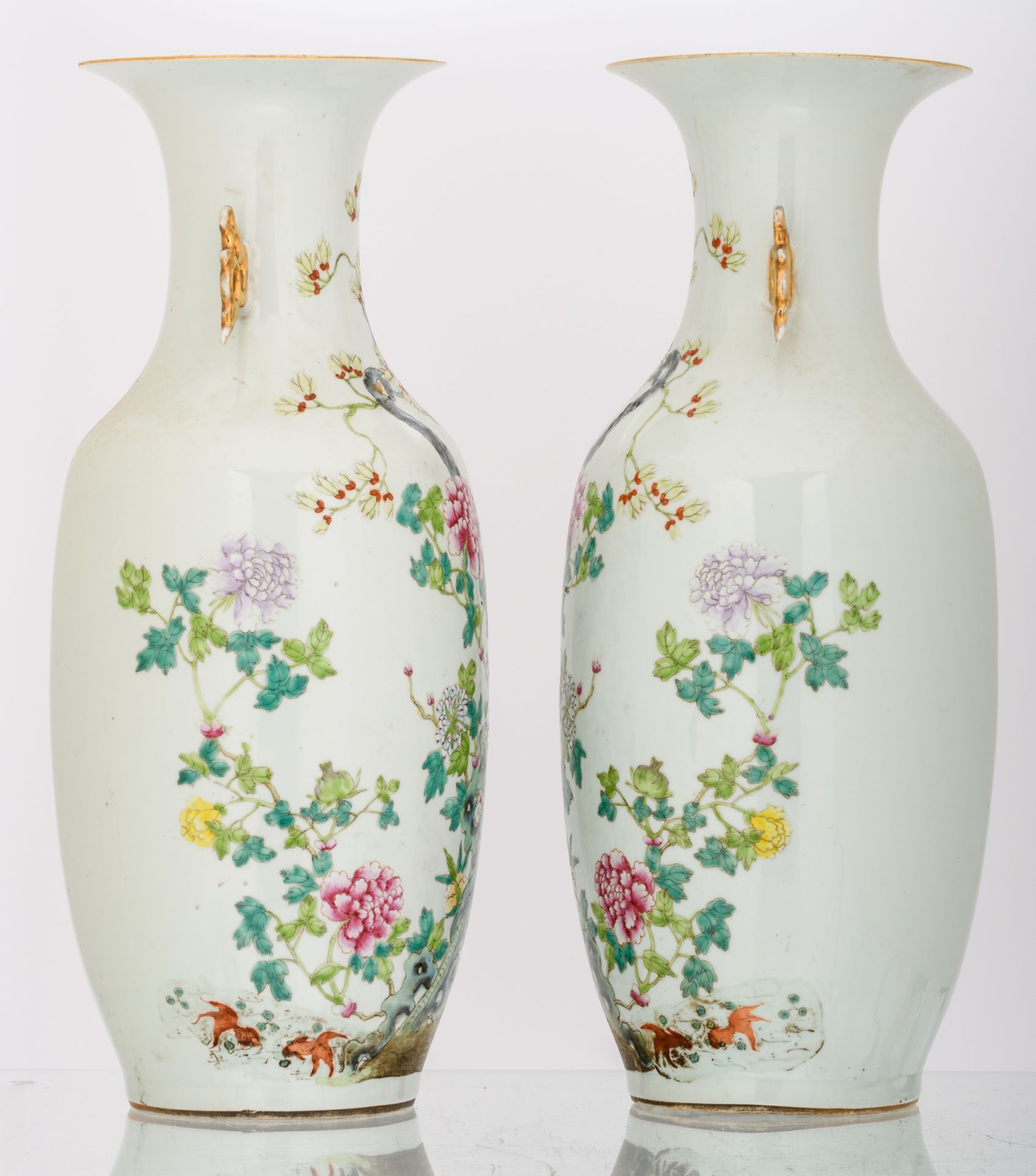 A pair of Chinese famille rose decorated vases with flower branches on a rock and bats, marked, H 58 - Image 2 of 6