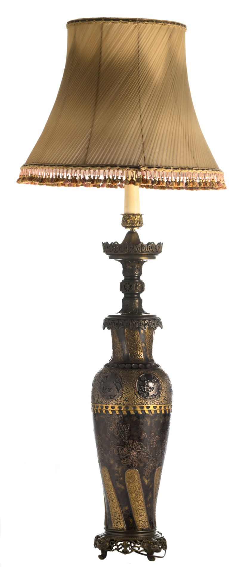 An early 20thC French Historism manganese and gold glazed earthenware lamp with brass mounts, H