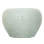 A Chinese celadon bowl, overall relief decorated with fish, H 25,5 cm