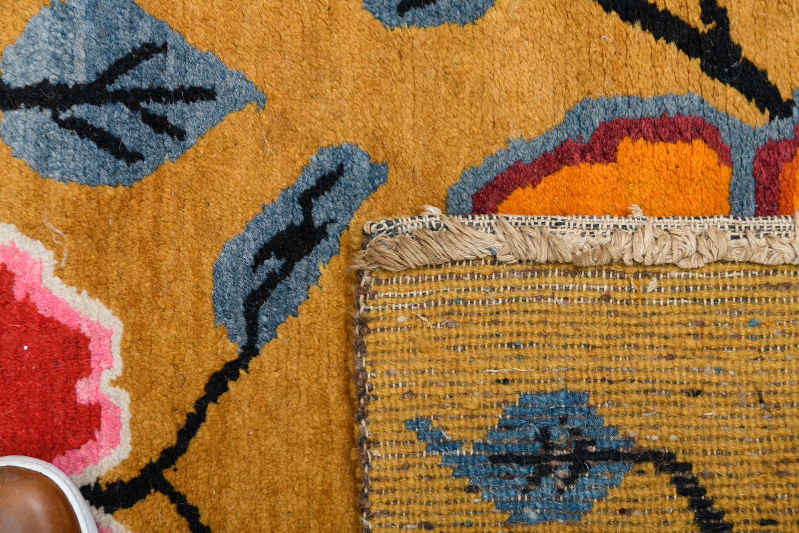 A pair of Sino-Tibetan carpets, wool on cotton, with styled floral motifs, 63 x 85 and 66 x 88 cm - Image 4 of 4