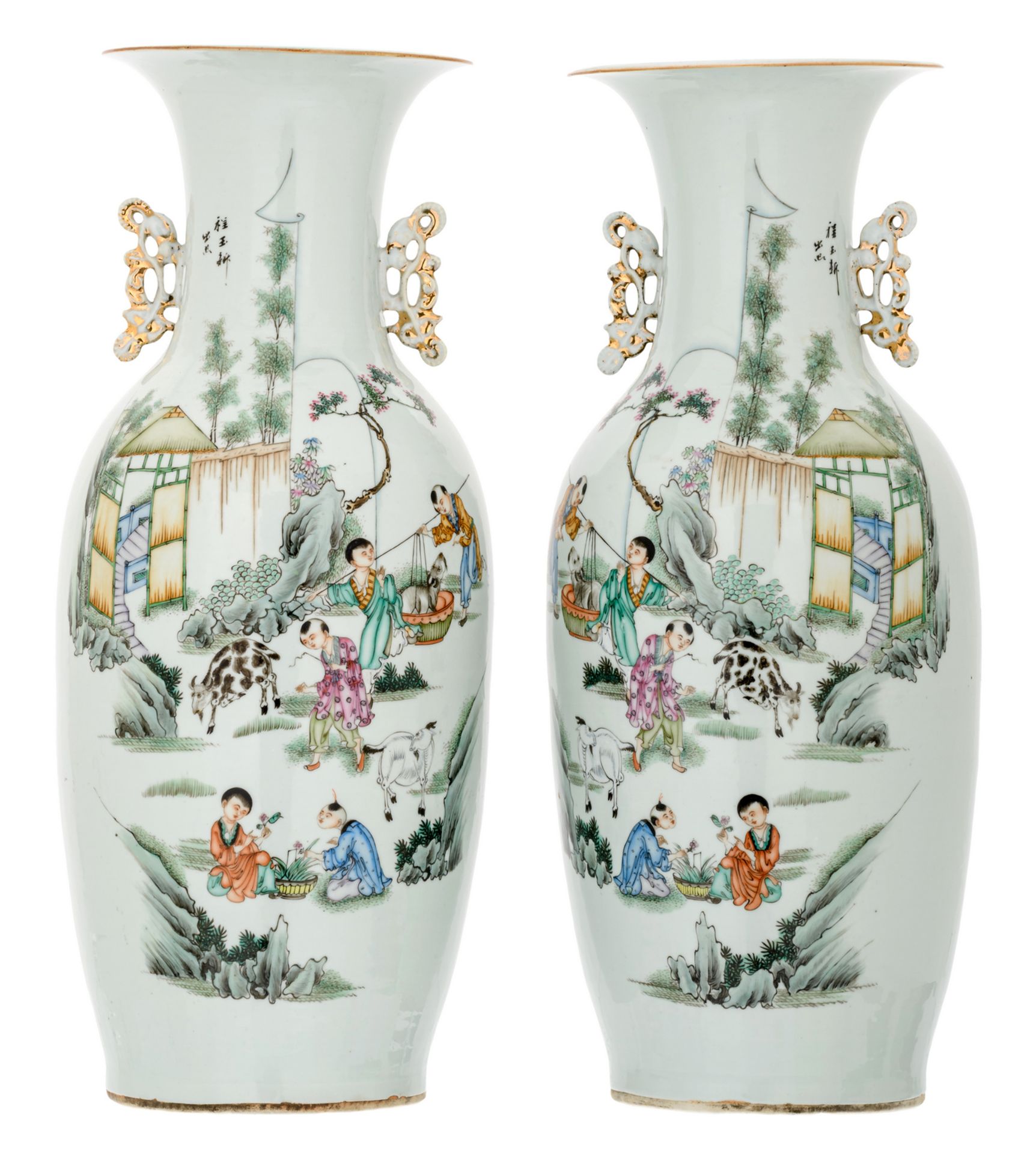 A pair of Chinese polychrome decorated vases with goats, boys playing in a garden and calligraphic