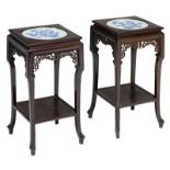 A pair of Chinese quadrangular carved hardwood occasional tables, the top decorated with a porcelain