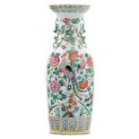 A Chinese famille rose vase, both sides decorated with birds and flower branches, 19thC, H 61,5 cm