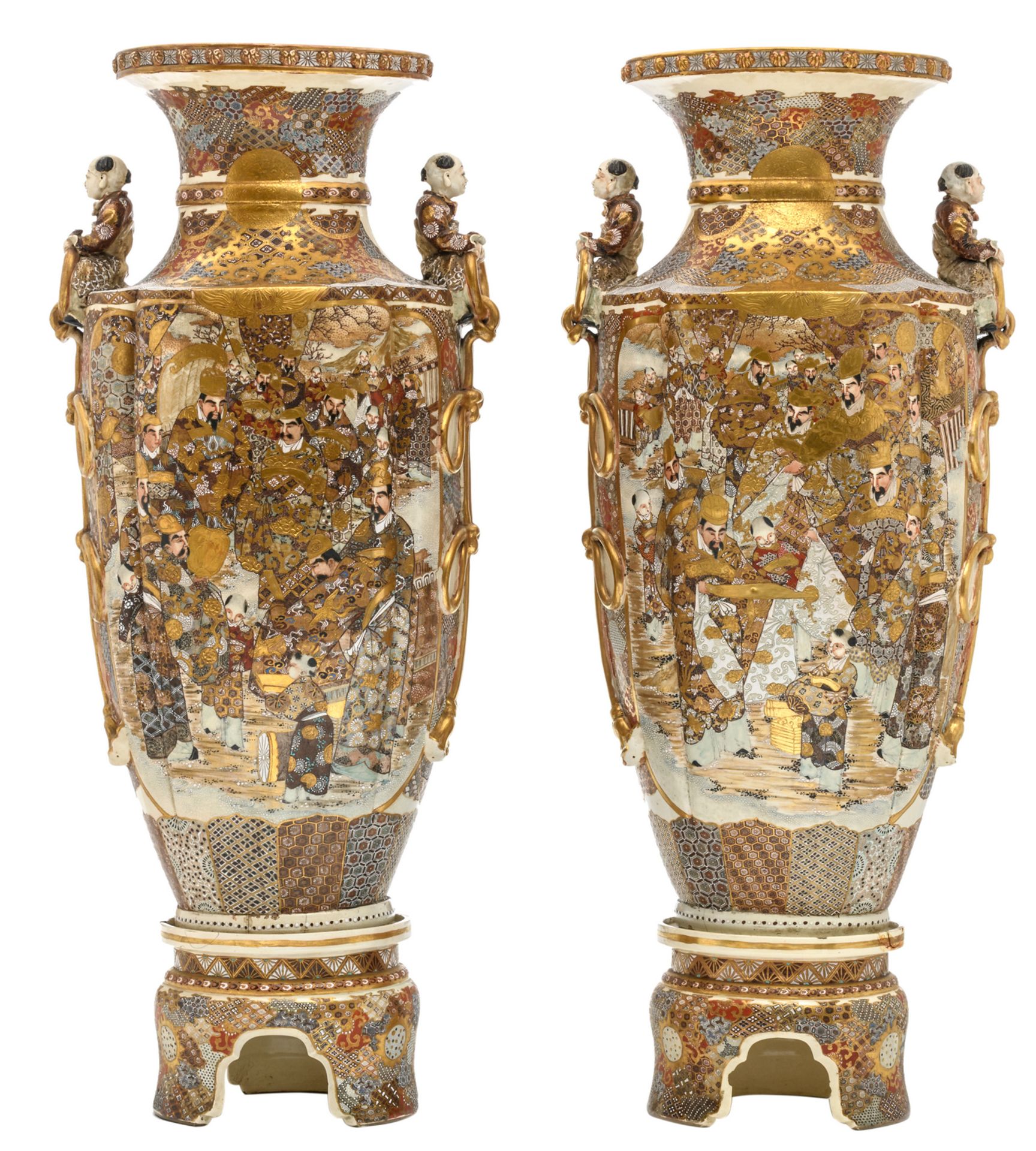A fine pair of Japanese Satsuma and relief decorated vases on ditto soccles, late Edo period, H