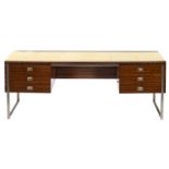 A 60s De Coene rosewood desk with a parchment top, H 74,5 - W 208 - D 98 cm