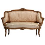 A Rococo style walnut sofa, H 90 - W 135 - D 63 cm