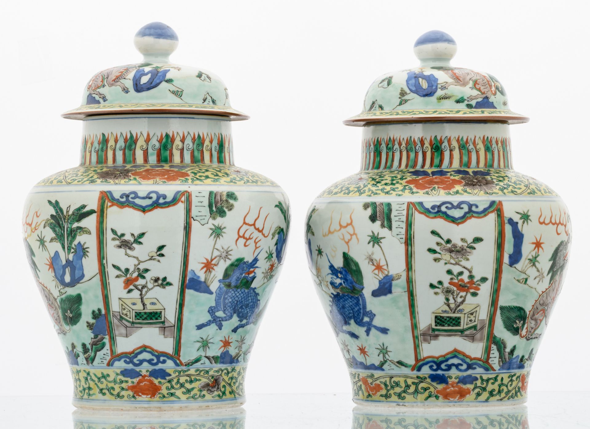 A pair of Chinese wucai overall floral decorated vases and covers with Fu lions, 17th/18thC, H 37, - Image 3 of 8