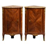 A pair of rosewood bronze mounted corner cupboards with a brèche d'Alep marble top, estampille N.