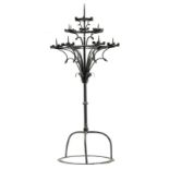 A wrought iron church candelabra, H 181 - W 81 cm